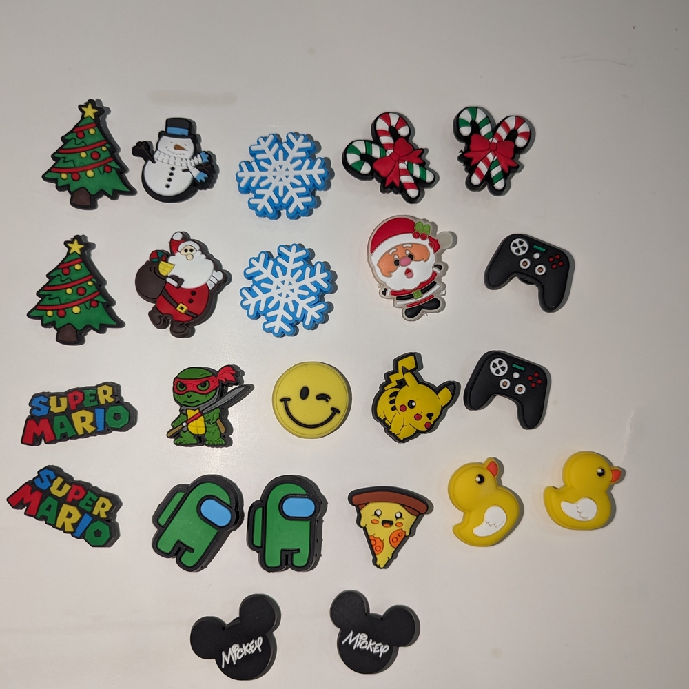 23 Assorted Croc Shoe Charms.